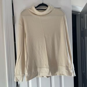 Cream colored Patagonia turtleneck sweater